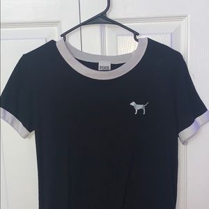 pink brand tee shirt with dog logo